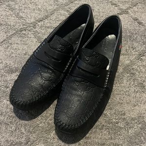 Black Leather Gucci Loafers.
